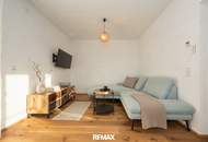 NEUBAU | Hochwertige Gartenwohnung mit traumhafter Küche, Terrasse und Garage in ruhiger Grünlage!