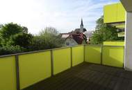 Neubauwohnung in Zentrumslage mit großer Balkon-Loggia und Carport