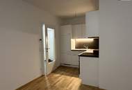 GROSSARTIG! Lichtdurchflutete 2-Zimmer-Neubauwohnung mit Südwestausrichtung, großzügigem Balkon, exklusiver Tischlerküche und Tiefgaragenplatz!