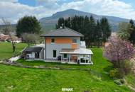 Neuwertiges Haus auf großem Baugrund in Randlage