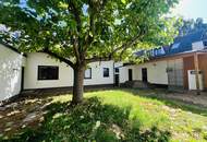 Mehrfamilienhaus mit Garten