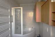 4-Zimmer-Terrassenwohnung mit ca. 100m² Garten und TG Stellplatz