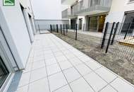 Ruhige Wohnung mit Terrasse und Garten in moderner Neubauanlage inkl. Garagenplatz - Befristet vermietet - Für Anleger und Eigennutzer!