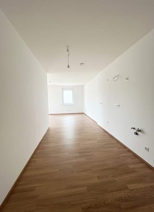 Neubau-Erstbezug im „ein viertel grün“ – hochwertig wohnen mit Balkon &amp; Tiefgarage