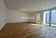 Hofseitige Gartenwohnung mit zwei sonnigen Terrassen &amp; zwei Bädern – Erstbezug BEIM DONAUUFER