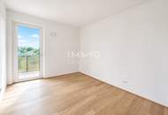 WOW-Balkon trifft Grünblick: 3-Zimmer-Erstbezug mit 28 m² Freifläche, Fußbodenkühlung & Geothermie