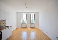 3-Zimmer-Altbau mit hofseitigem Schlafzimmer und Gemeinschaftsterrasse