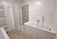 ERSTBEZUG: 4-Zimmer-DG-Wohnung mit West-Balkon und Carport