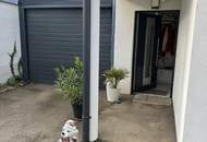 FAMILIENDOMIZIL MIT GARTEN UND GARAGE