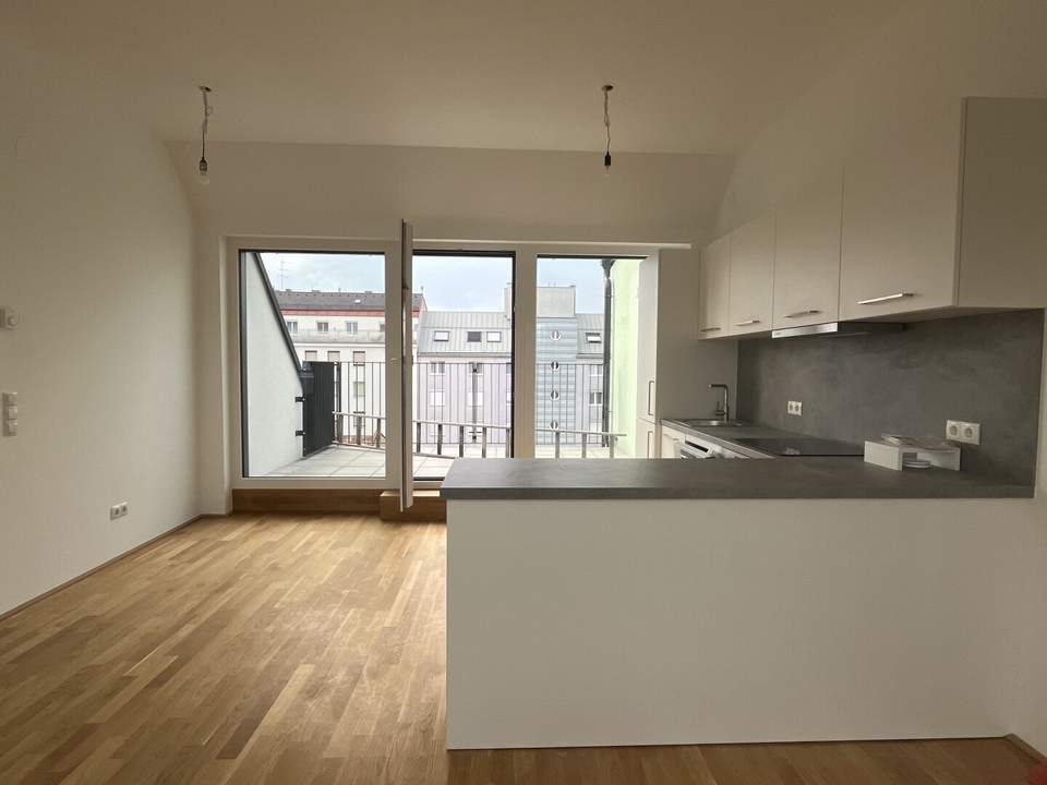 Wunderschöne 4 Zimmer Dachterrassenwohnung in Top Lage- Beautiful four-room roof top apartment with a terrace in a prime location