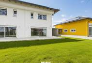 Wohnen auf höchstem Niveau – Energieautarke Premium‑Doppelhaushälfte mit Garten