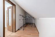 "Familienfreundliches Einfamilienhaus mit Wellnessbad, Sauna, Kachelofen, Fußbodenheizung, großem Garten und Doppelgarage in Tulln"
