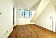 Exklusive 2-Zimmer-DG-Wohnung mit Weitblick und außergewöhnlichem Lichteinfall