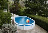 Grüne Oase mit Pool und Traumblick