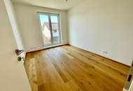 ERSTBEZUG! Geräumige Eigentumswohnung im Obergeschoss mit Balkon und größer Dachterrasse