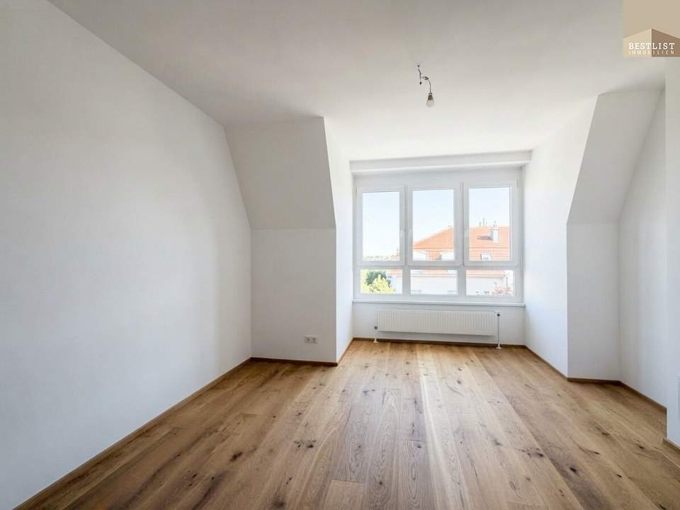 Lichtdurchflutete 3-Zimmer-Wohnung mit neuem Parkettboden, Grünblick und Garage