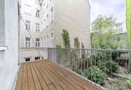 4-Zimmer-Altbauwohnung mit Balkon und Fischgrätparkett in ruhiger Innenhoflage