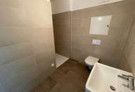 Stylische 1 Zimmer Erstbezugswohnung mit Balkon &amp; Garage in Maria Enzersdorf – Ihr neues Zuhause!