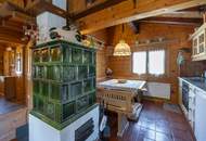 „Wohnen im Einklang mit der Natur – Stilvolles Holzhaus in traumhafter Ruhelage auf unverbaubarem Grundstück“