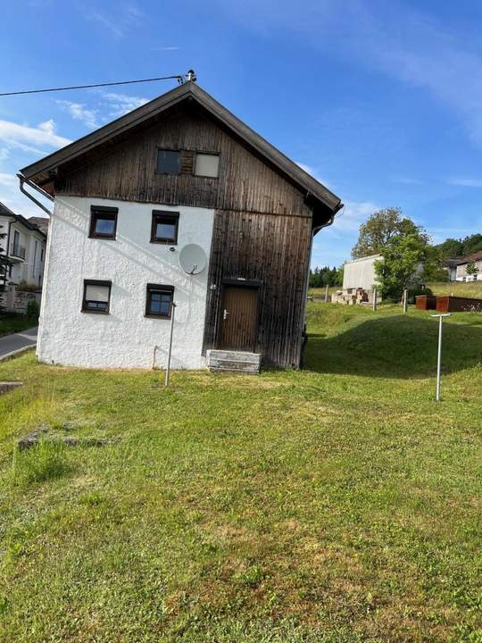 Grundstück mit Altbestand und Traumaussicht in ruhiger Lage