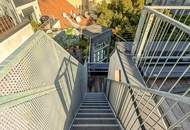 Provisionsfrei: Klimatisierte Dachgeschoss Maisonette mit 2 Terrassen und Kamin nahe Uno City!