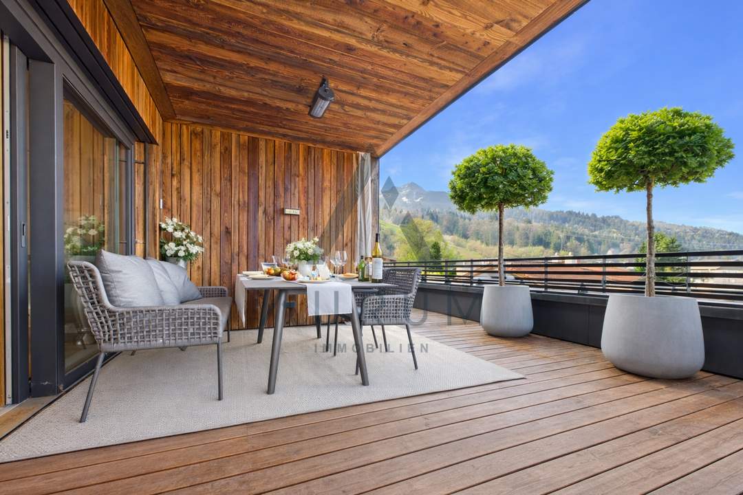 Penthouse mit Dachterrasse &amp; Whirlpool in zentraler und pistennaher Lage mit Kaiser- &amp; Hornblick