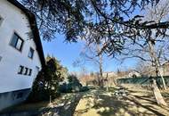 GROßZÜGIGES ZWEIFAMILIENHAUS MIT 1.548 m² TRAUMGARTEN IN ZENTRALER GRÜNLAGE