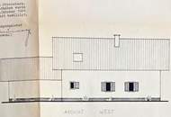 Älteres Wohnhaus mit angebauter Doppelgarage im Freiland