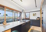 Penthouse mit Dachterrasse &amp; Whirlpool in zentraler und pistennaher Lage mit Kaiser- &amp; Hornblick