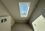Helle Dachgeschoßwohnung mit Terrasse & Grünblick | 2 Zimmer | ERSTBEZUG