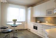 Ruhig gelegene Neubauwohnung mit großer Loggia - 60m² Wfl. plus 7,60m² Loggia - 2 Zi., Küche, Bad, WC, Garagenplatz!