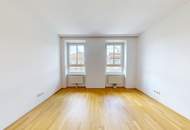 Historischer Charme trifft moderne Wohnqualität – 3-Zimmer-Wohnung mit Innenhof-Terrasse