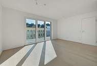 Urbanes Wohnen mit viel Freiraum – Neubauwohnung mit großem Balkon im Erstbezug