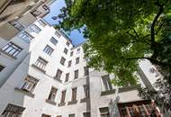 MITTEN IM SIEBTEN | Südseitige Stil-Altbauwohnung mit Grünblick | Hofruhelage | Prachtvolles Jahrhundertwende-Haus