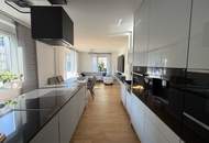 Moderne & zentrale 2-Zimmer-Eigentumswohnung mit Garten und Tiefgaragenplatz