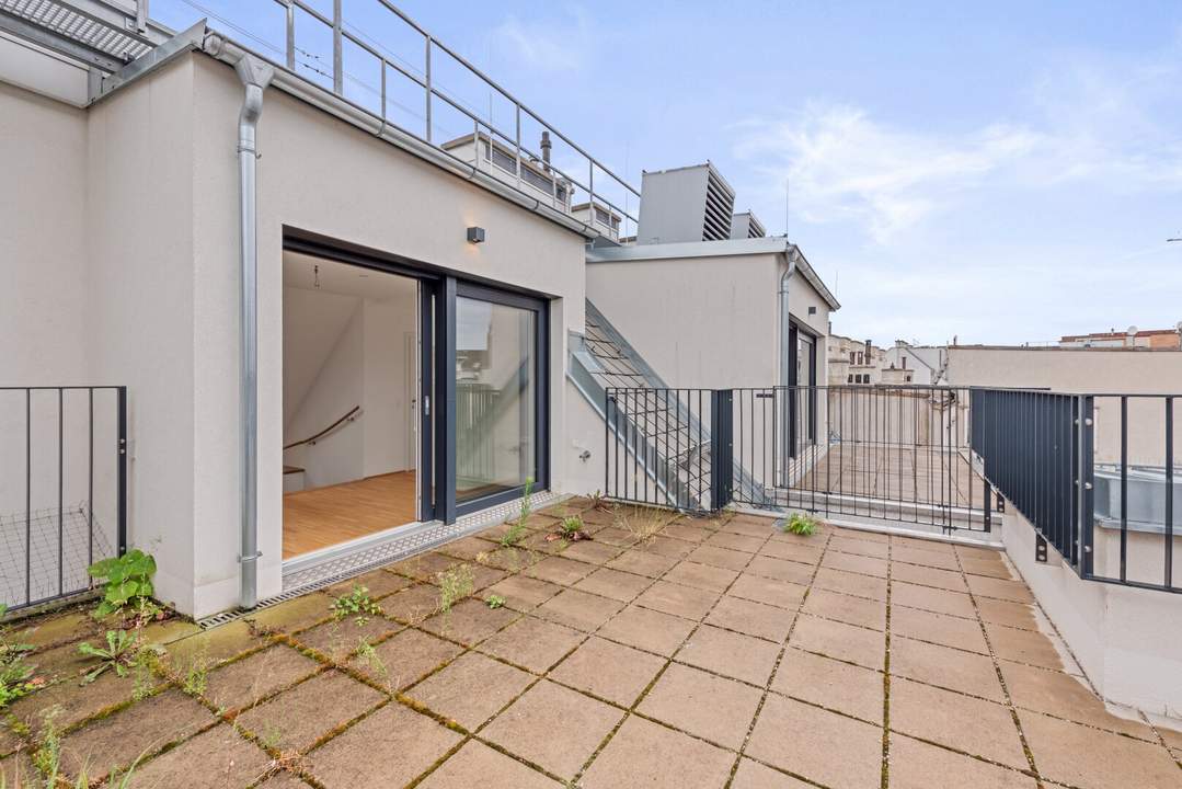 Erstbezug - Atemberaubende Dachterrasse in den Innenhof!