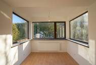 Teilsaniertes Wohnhaus mit viel Platz, Grünblick und Entwicklungspotenzial in Zentrumsnähe