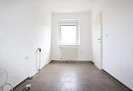 Renovierte-3-Raum-Eigentumswohnung mit Balkon und 203 m² Eigengarten