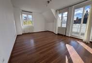 Ruhige 2-Zimmer Wohnung mit Grünblick, Terrasse und 2 Garagenplätzen