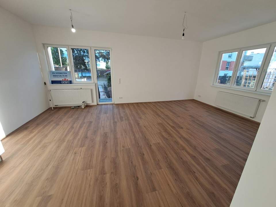 Erstbezug nach Kernsanierung – Großzügige Gartenwohnung in zentraler Lage