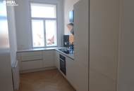 Nahe Stephansplatz - ERSTBEZUG ab 15.1.2026 - erstklassig sanierte Altbauwohnung mit kleinem Balkon im Jahrhundertwendehaus