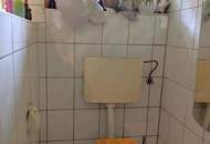 Sanierungsbedürftiger Bungalow mit großem Grundstück - in ruhiger, sonniger Lage