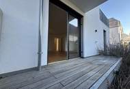 Erstbezug: 3 Zimmer-Mietwohnung mit sonnigen Terrassenflächen und Garten