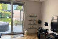 Top ausgestattetes GARTENAPARTMENT mit einer EXTRA TERRASSE und einem TIEFGARAGENPLATZ