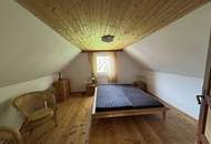 Südliches Baugrundstück in Hanglage mit traumhaftem Blick und Altbestand