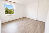 Großzügige 3 bis 4-Zimmer-Wohnung mit Kamin, sonniger Loggia und Stellplatz
