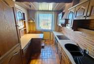 ca. 160m² NFL | Einfamilienhaus im Grünen | große Garage & Keller | Renovierungsbedarf