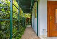 Familienfreundliches Einfamilienhaus mit idyllischem Garten und Aussichtsterrasse samt Doppelgarage