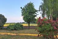 Weiler-Lage! Ein-/Mehrfamilienhaus mit 2 Garagen und Werkstätte - Wolfern / inmitten ebener Grünlandschaft