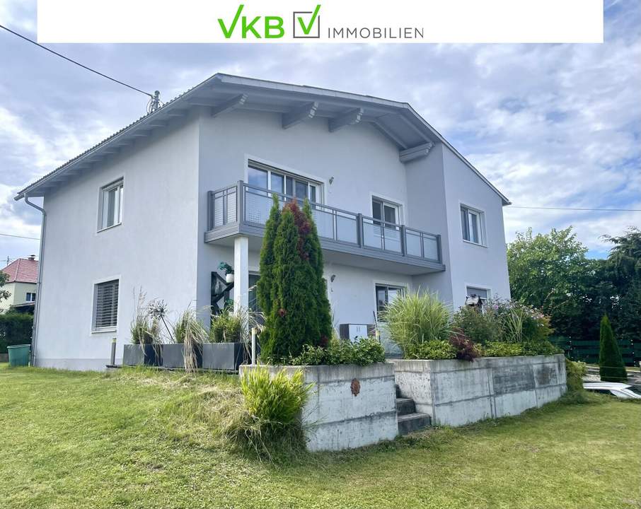 Wohnen & Wohlfühlen – Modernes Haus mit Gartenidylle für zwei Familien